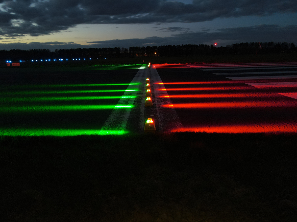S4GA portable runway threshold lights on airfield at night